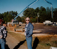 Image of General Contractor Terry Fox and a member of his Atlanta team on a construction site in 1995.  Fox Building has been a general contractor in the southeastern U.S. since 1985.
 